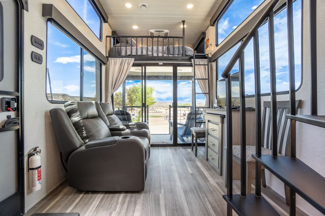 Living area with recliners and deck access