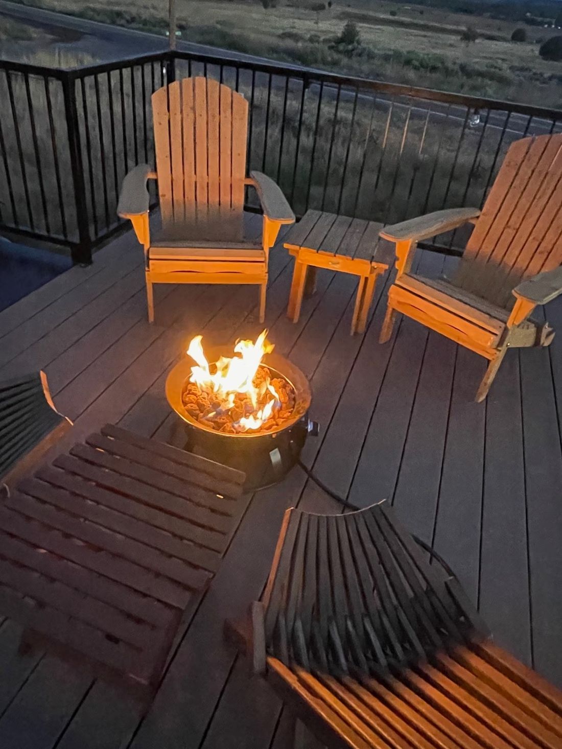 Rooftop deck fire pit at sunset